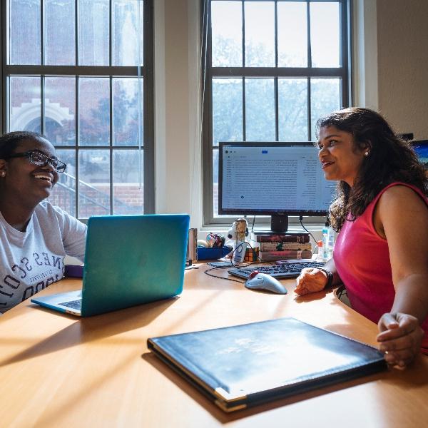 Agnes Scott College student taking advantage of career communities and talking with a career coach.